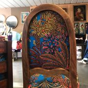Art Nouveau chair with floral fabric and carved wood