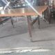 Extendable dining table in walnut, mahogany and chrome, circa 1960