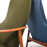 Pair of mid century Danish reclining lounge chairs in teak