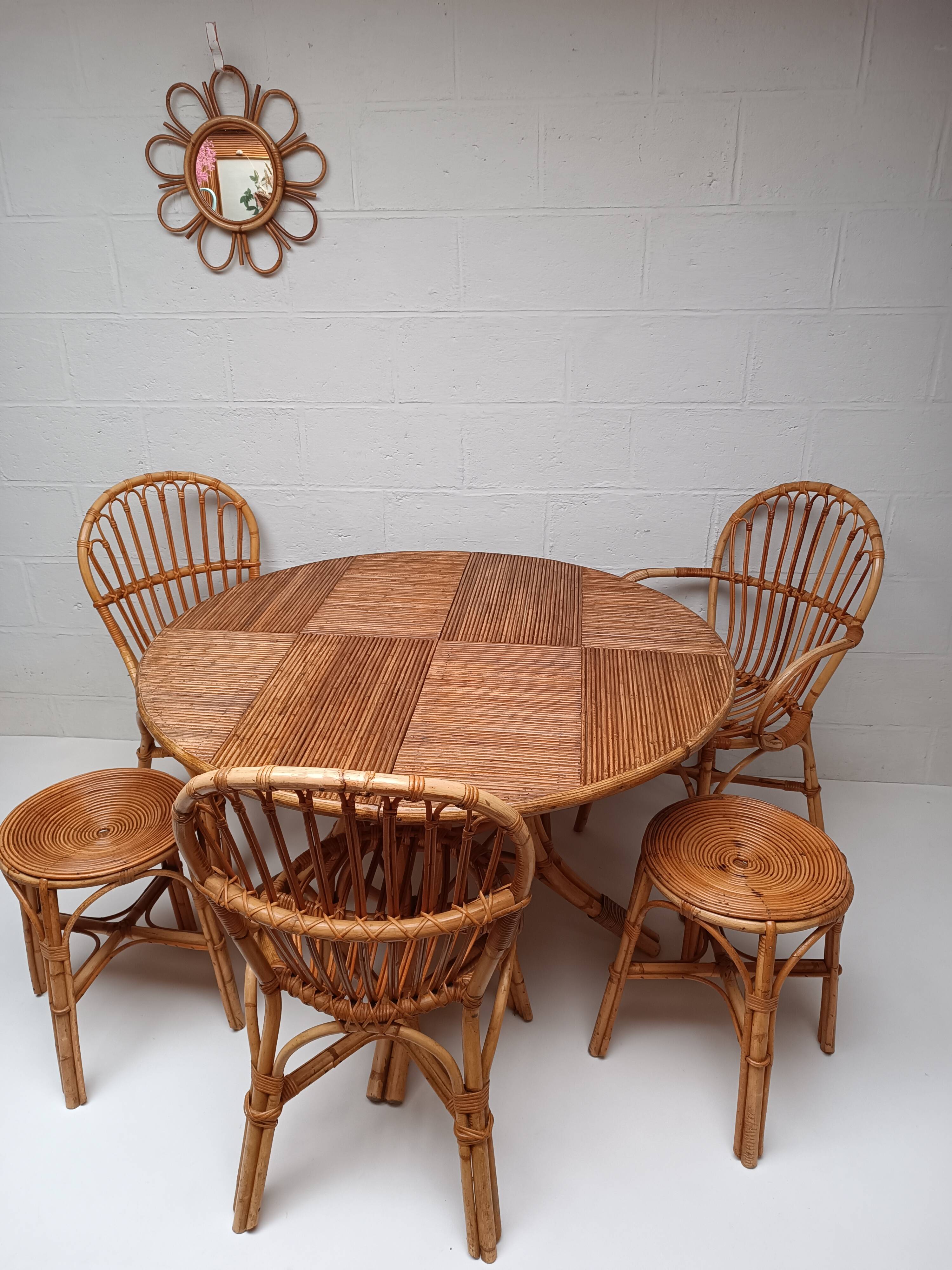 Bamboo table with extensions, 3 chairs and 3 stools from the 1960s.