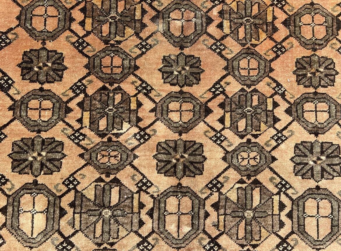 Old faded terracotta rug | Turkmen tribal wool rug