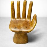 Sculptural armchair in solid wood – hand shape