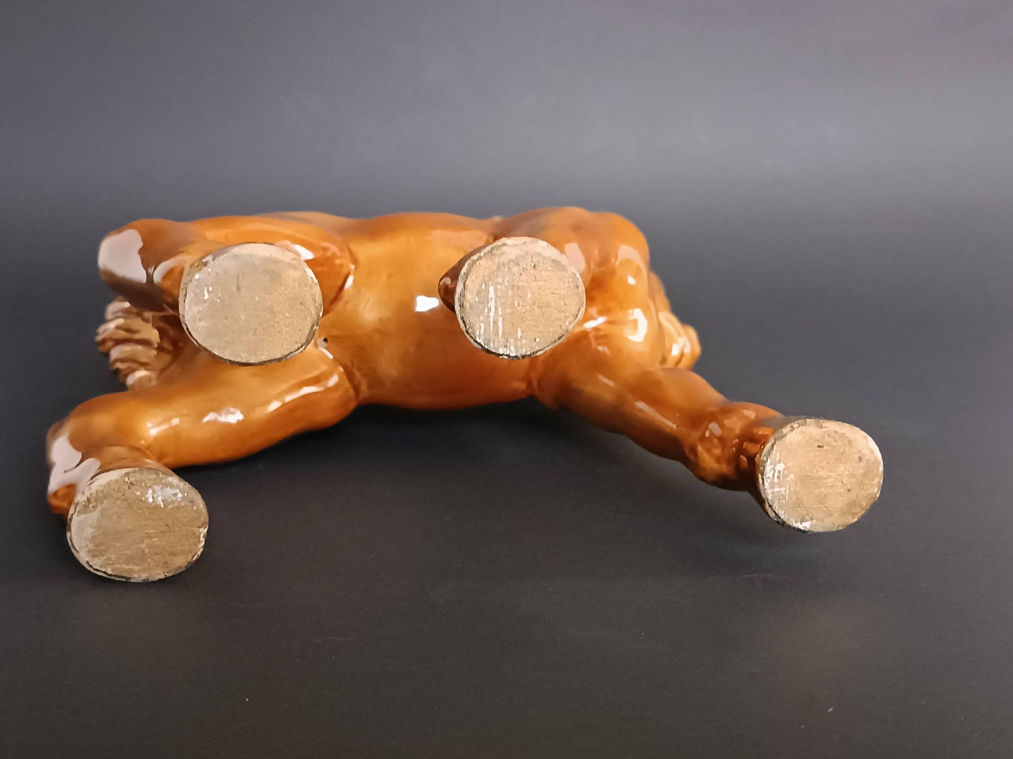 Ceramic horse sculpture with wild glaze and gold, signed Art Deco.