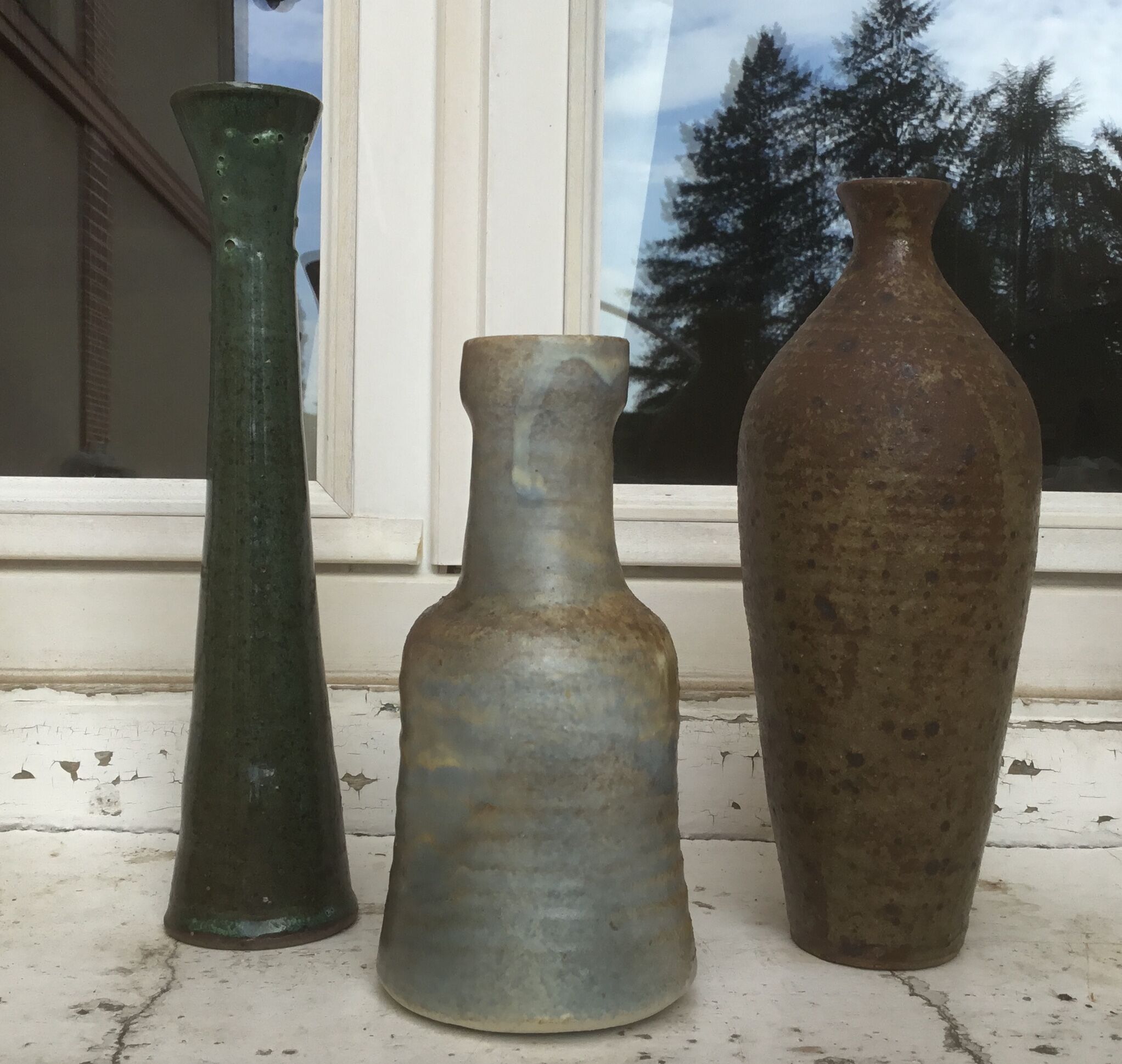 Vintage sandstone vase trio