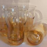 Four iridescent honey blown glass glasses