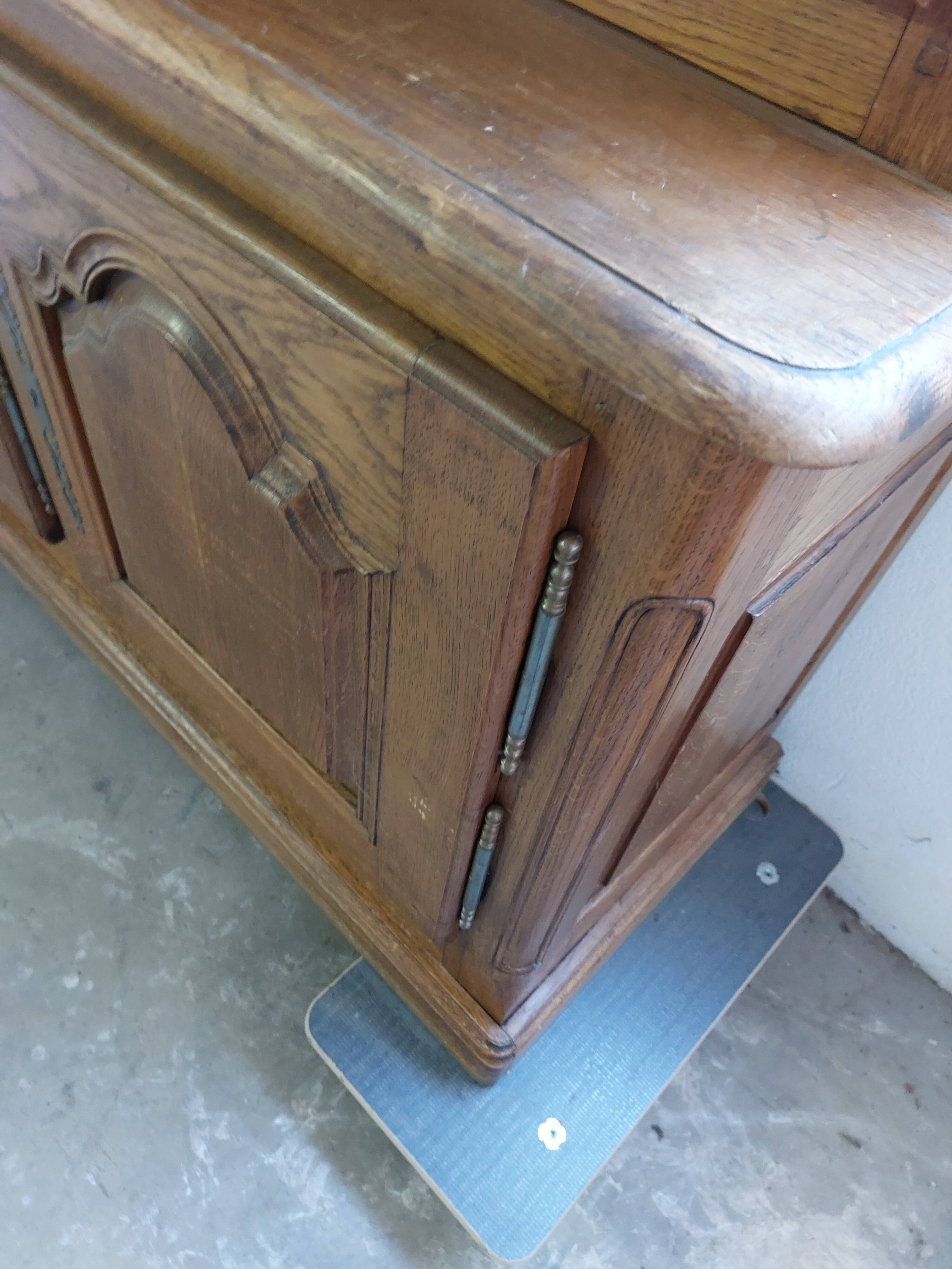 Showcase library with two sections in solid oak.