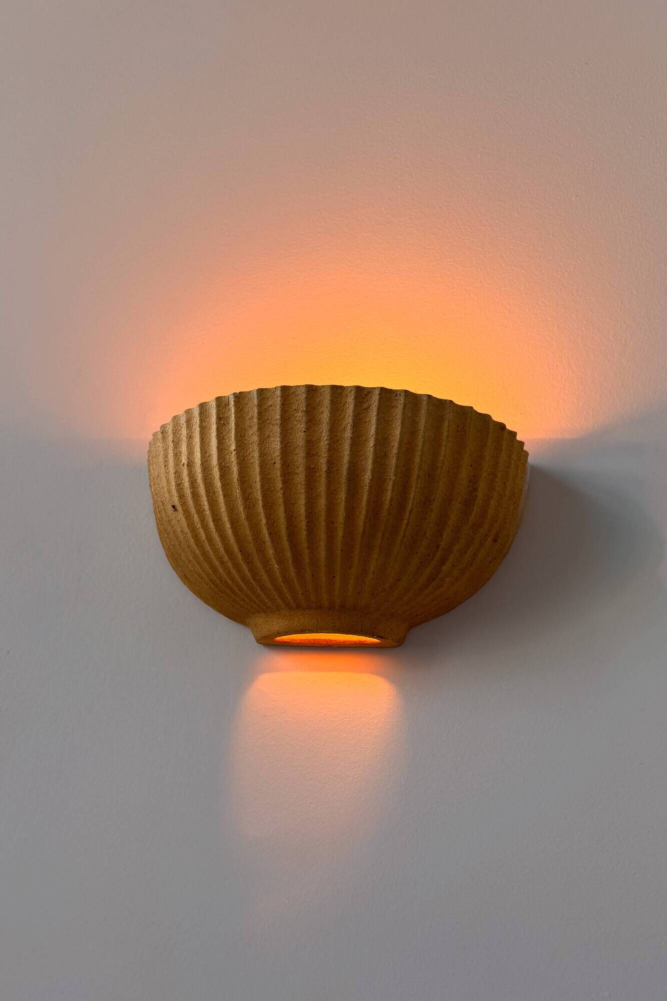 Pair of vintage beige ceramic wall lights, France, 1970.