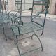 Deux fauteuils et deux chaises de jardin en fer forgé 20 eme
