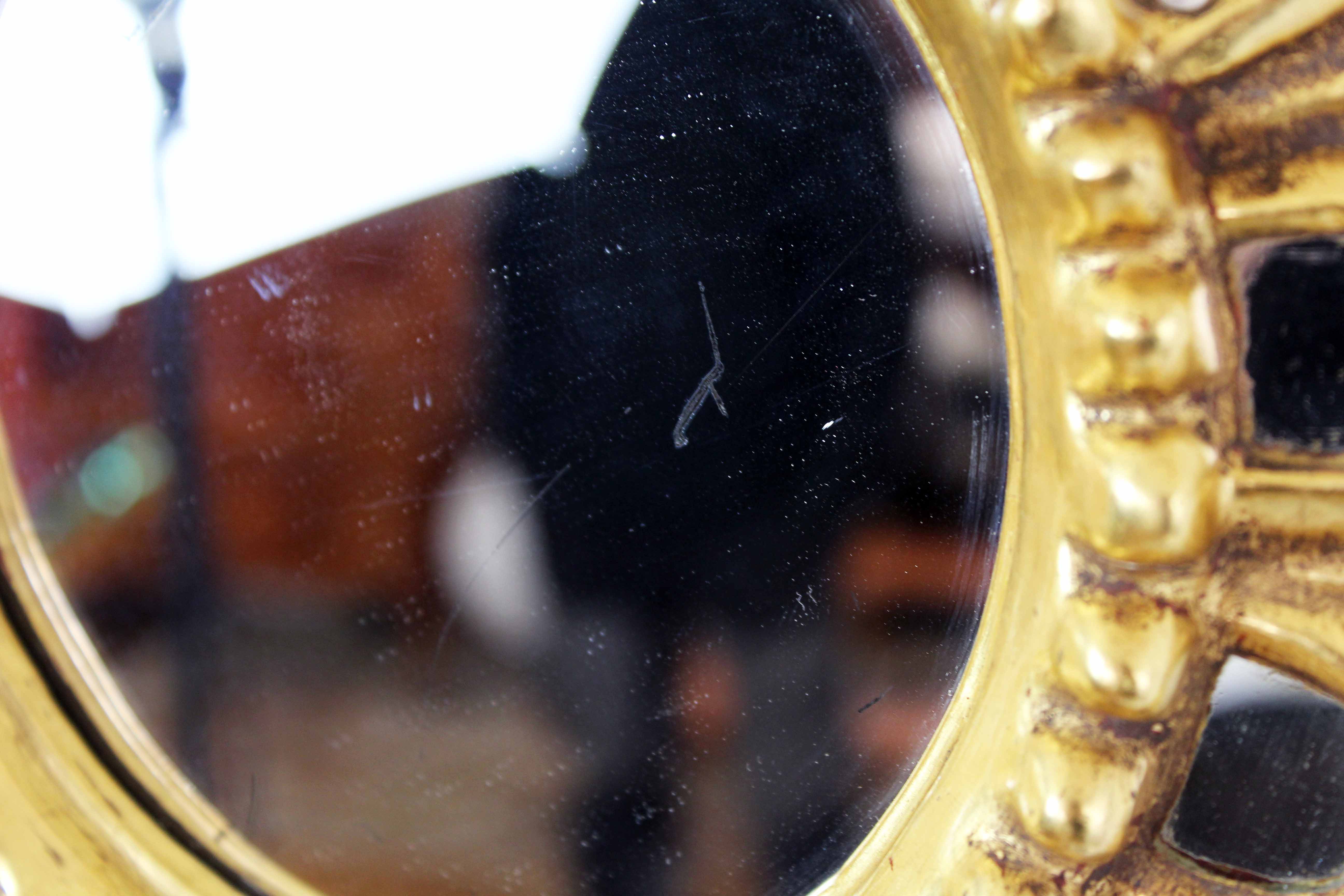 Sun mirror in wood and gilded stucco