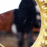 Sun mirror in wood and gilded stucco