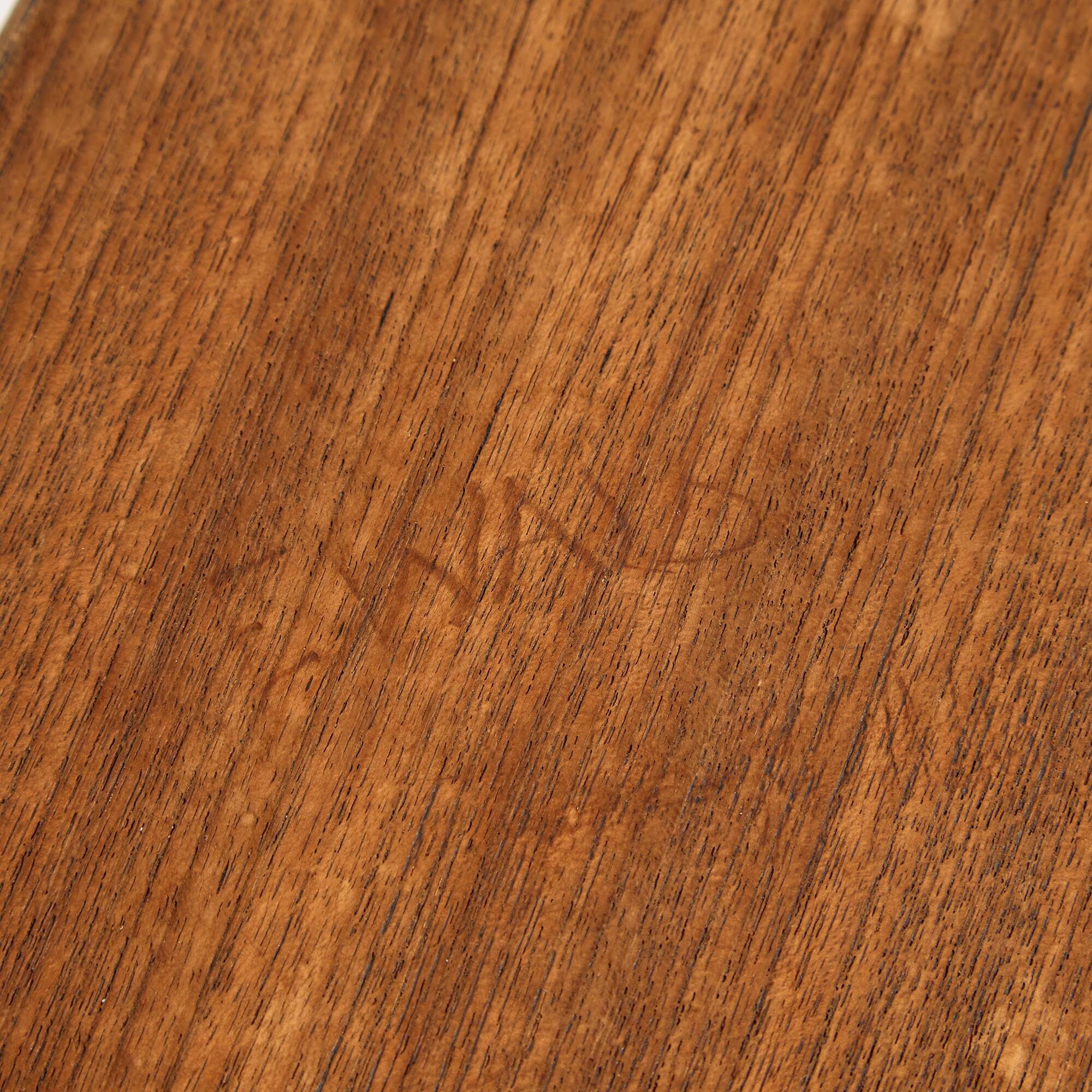 Teak chair with writing tablet