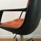 Vintage orange armchair model 451 with wheels by Steelcase Strafor, design by Randall Buck