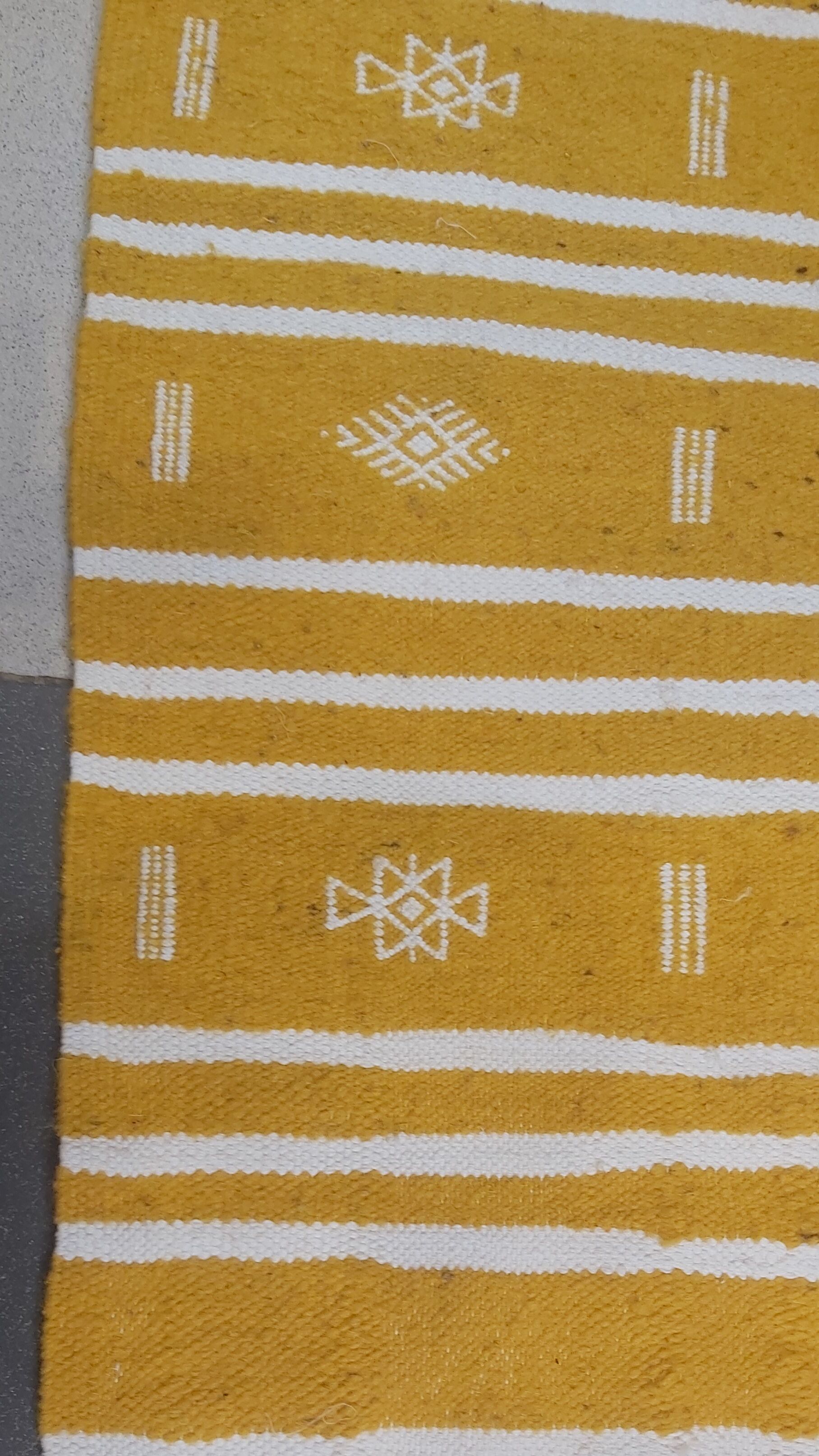 Handmade yellow and white kilim carpet
