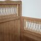 Children's bed in wood and sandblasted rattan from the 1960s.