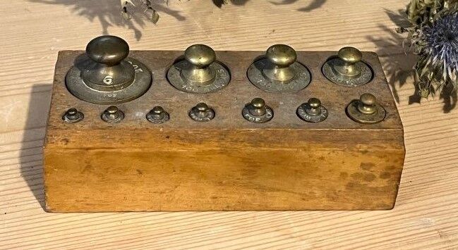 Complete series of brass weights for scales