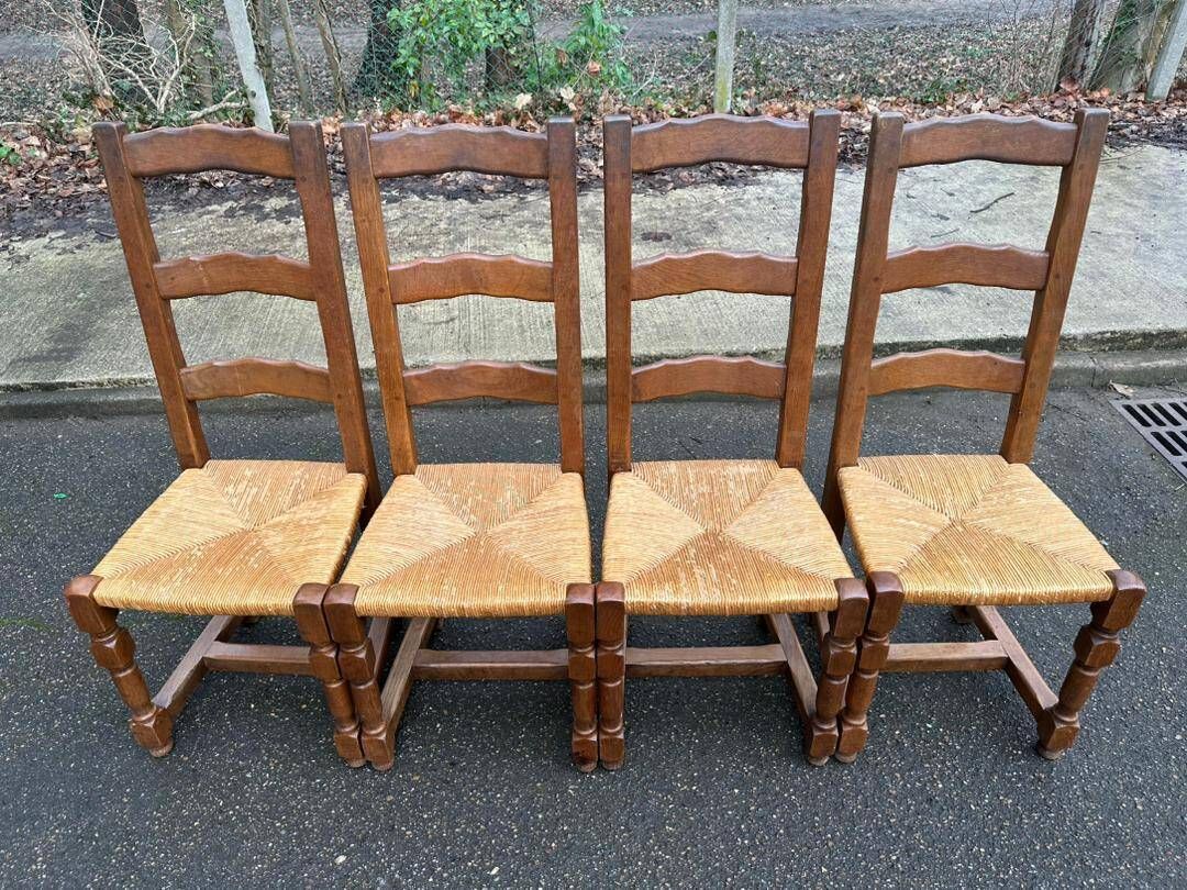 4 dining chairs made of solid wood with straw seats, farmhouse style, medium oak, 20th century, 110cm.