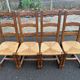 4 dining chairs made of solid wood with straw seats, farmhouse style, medium oak, 20th century, 110cm.