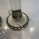 Pair of candlestick holders in crystal and gilded brass, Baccarat decoration.