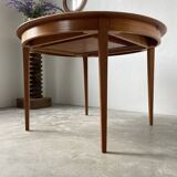 Scandinavian round teak table with extension