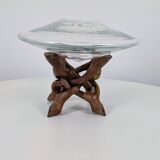 Glass cup molded on carved exotic wood