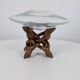 Glass cup molded on carved exotic wood