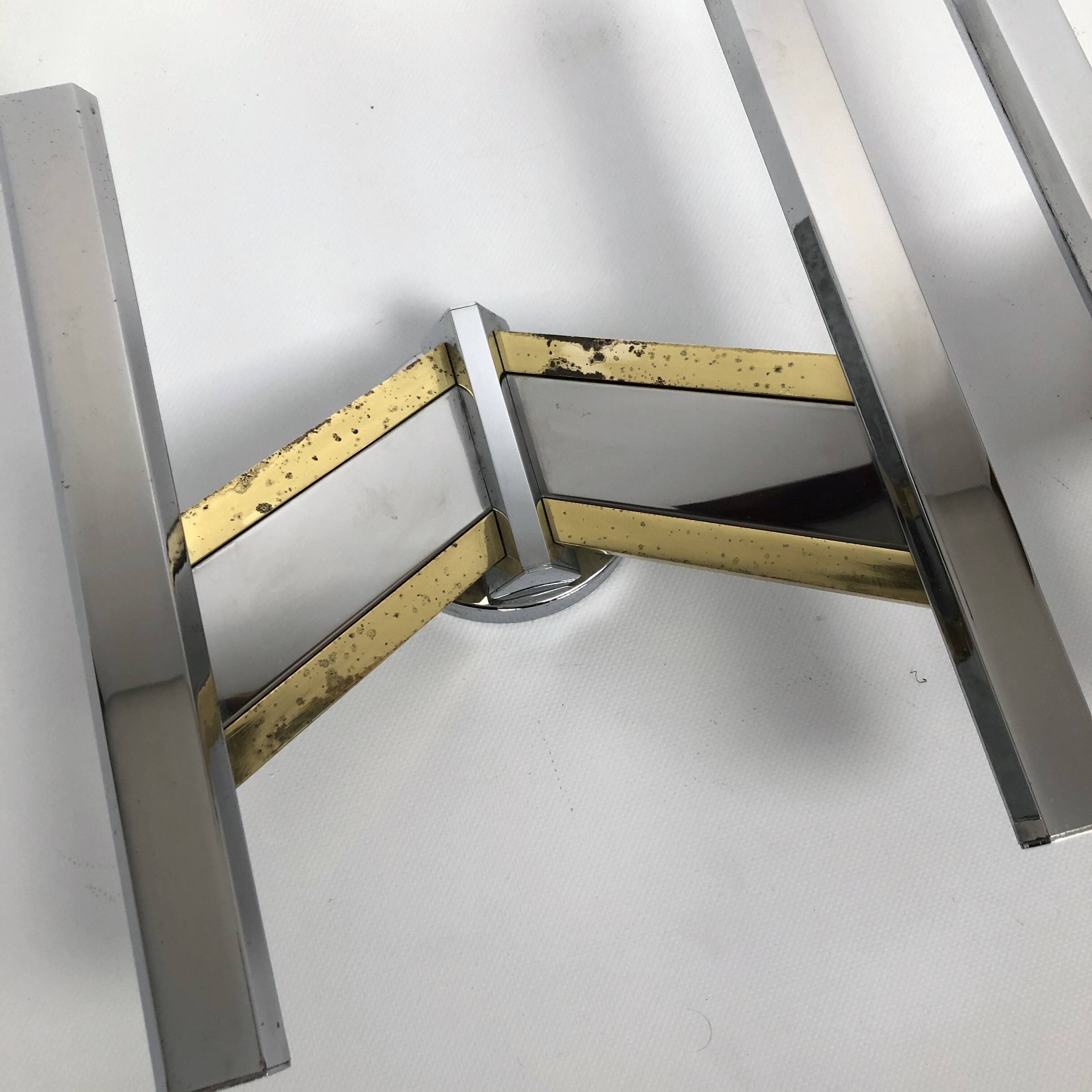 Pair of brass and chrome sconces from Sciolari 70