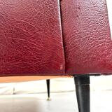 Vintage burgundy armchair, compass base in black metal and brass