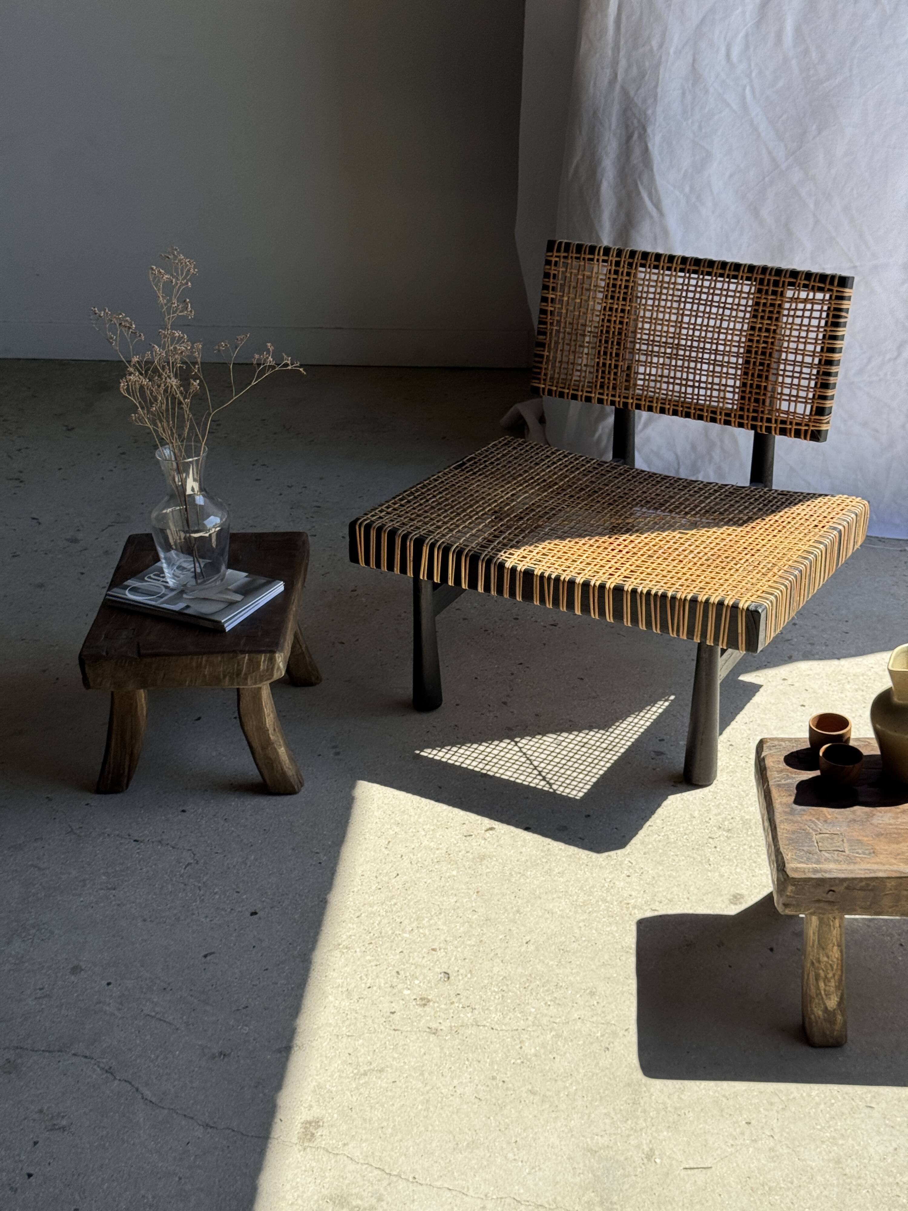 Small stool, rectangular solid teak side table with curved legs.