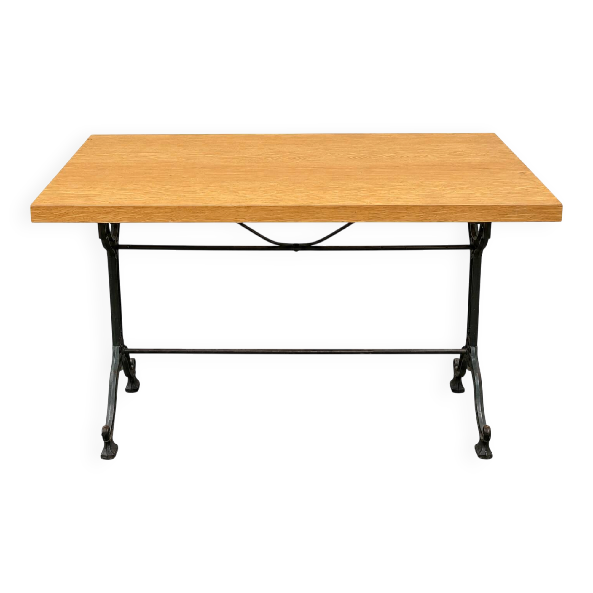 Old bistro table in engraved wrought iron