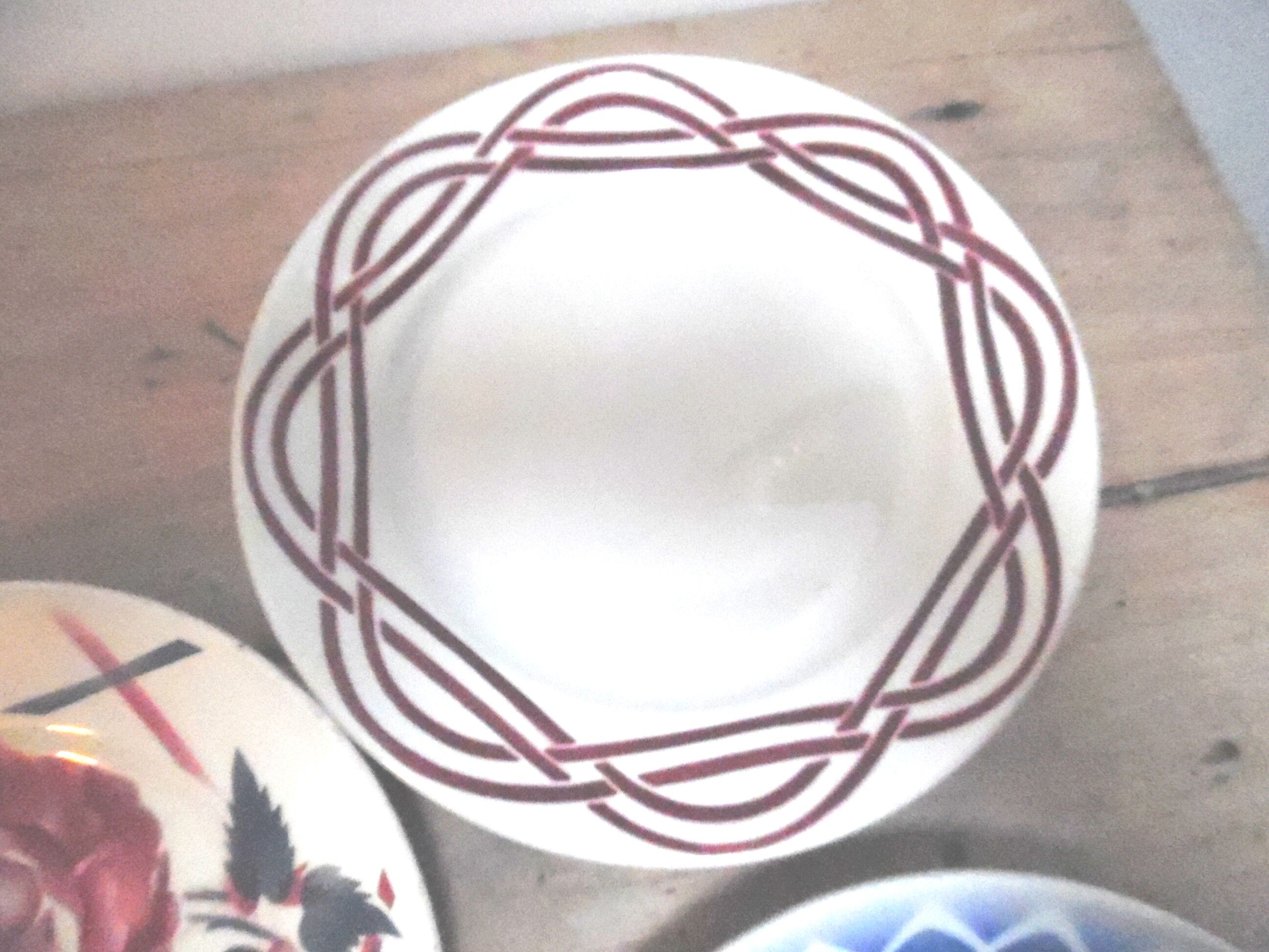 Six plates mismatched earthenware