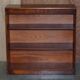 Pair of open dwarf bookshelves in mahogany by Shaws of London.
