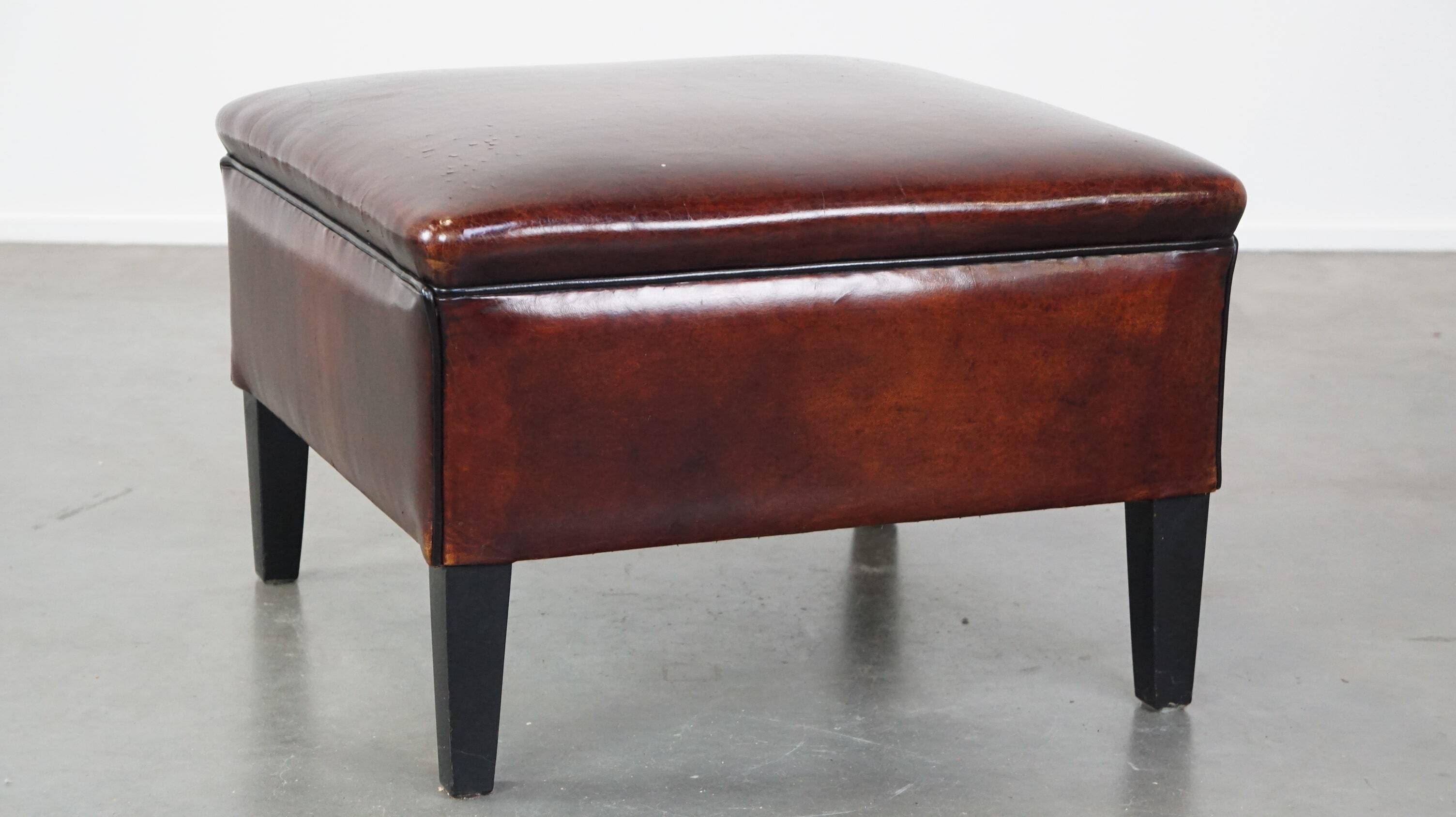 Large square sheepskin leather ottoman with a beautiful patina