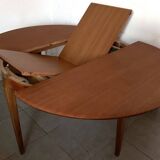 Scandinavian round teak dining table from the 60s extendable