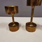 Three beautiful candle holders in solid brass, for block candles.