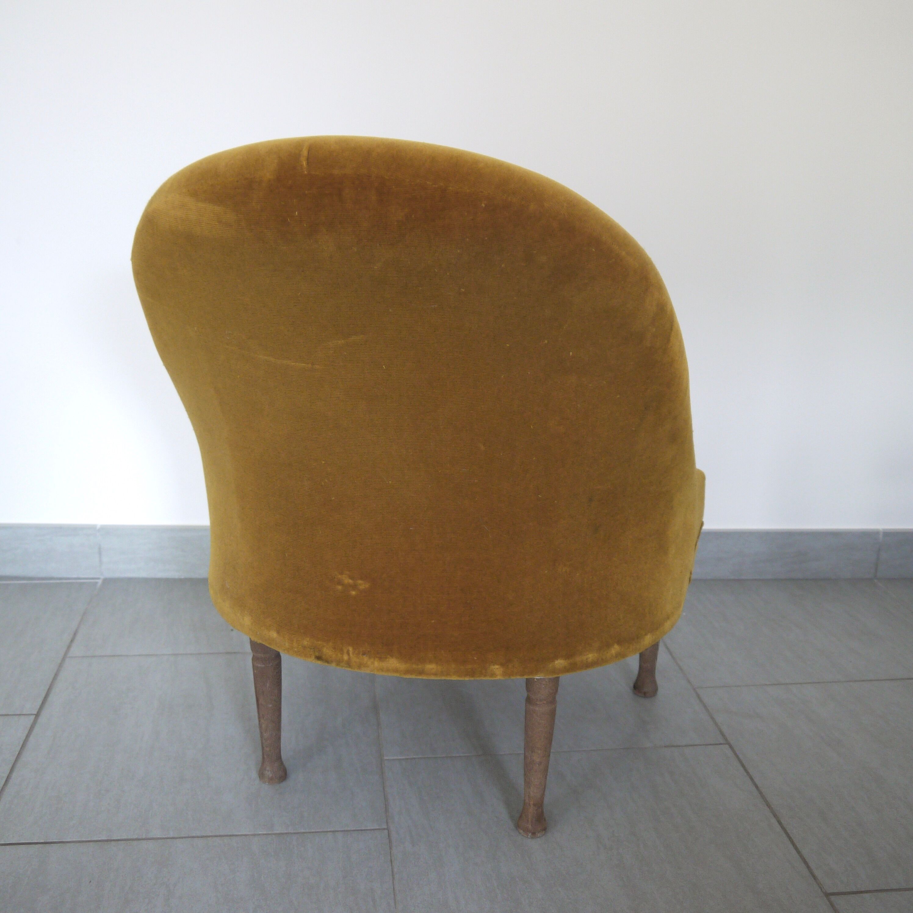Yellow velvet padded toad armchair