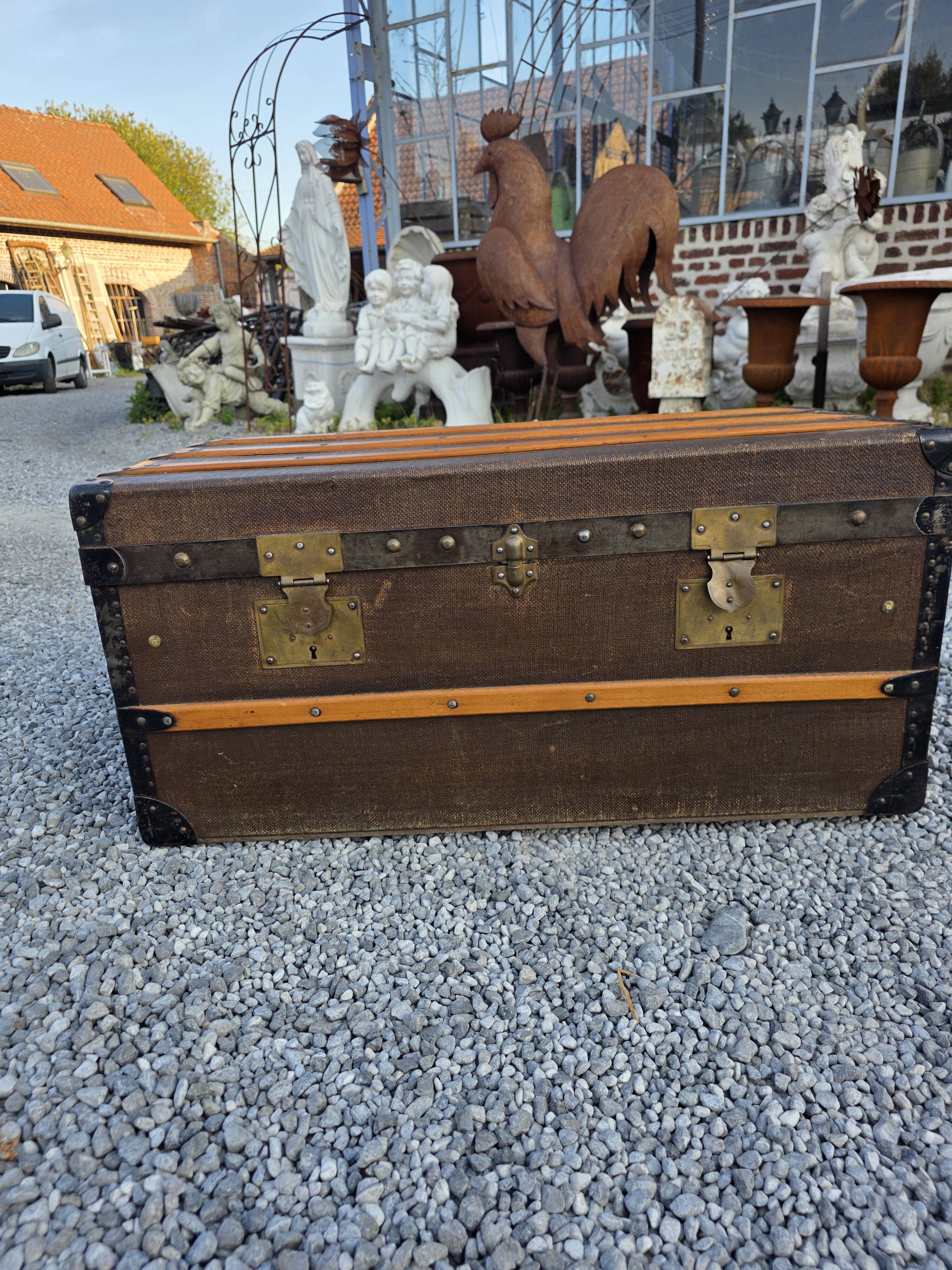 Old travel trunk in oilcloth