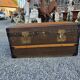 Old travel trunk in oilcloth
