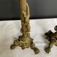 Pair of 19th-century gilded bronze candlesticks in Empire style.