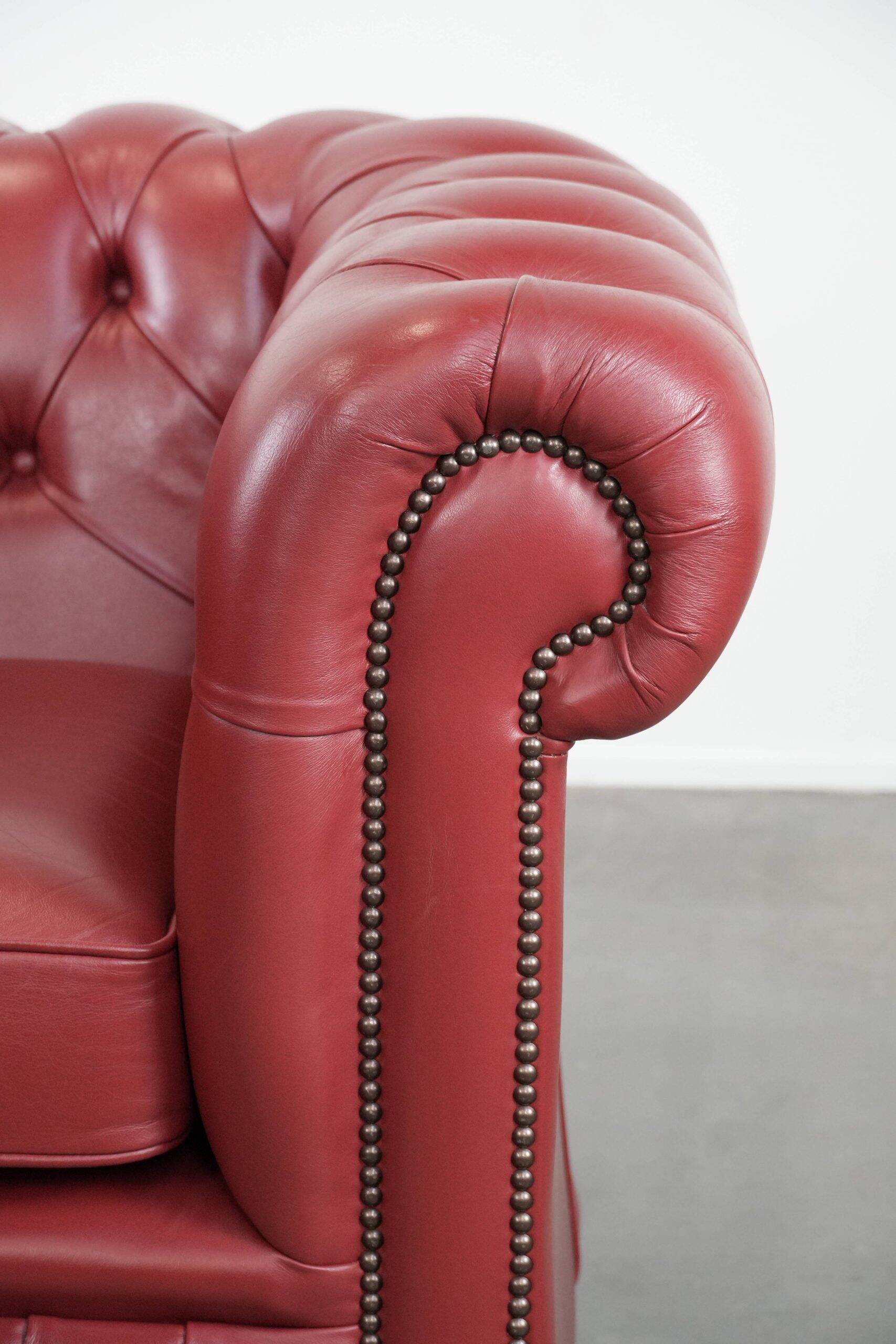Amazing English cowhide Chesterfield armchair in a stunning red colour
