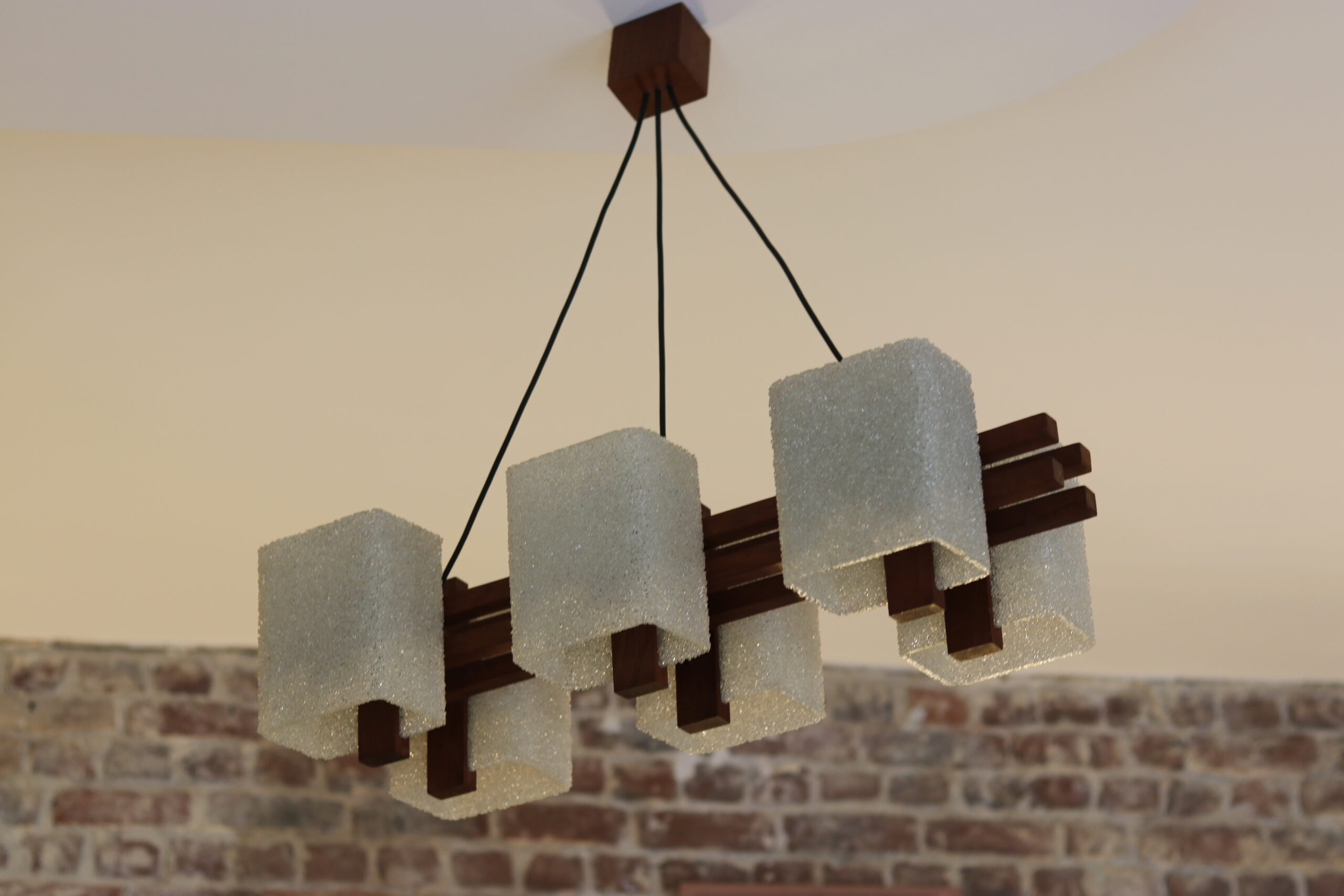 1960s Scandinavian suspension light in teak and perspex.