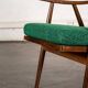 Boomerang chair in green fabric