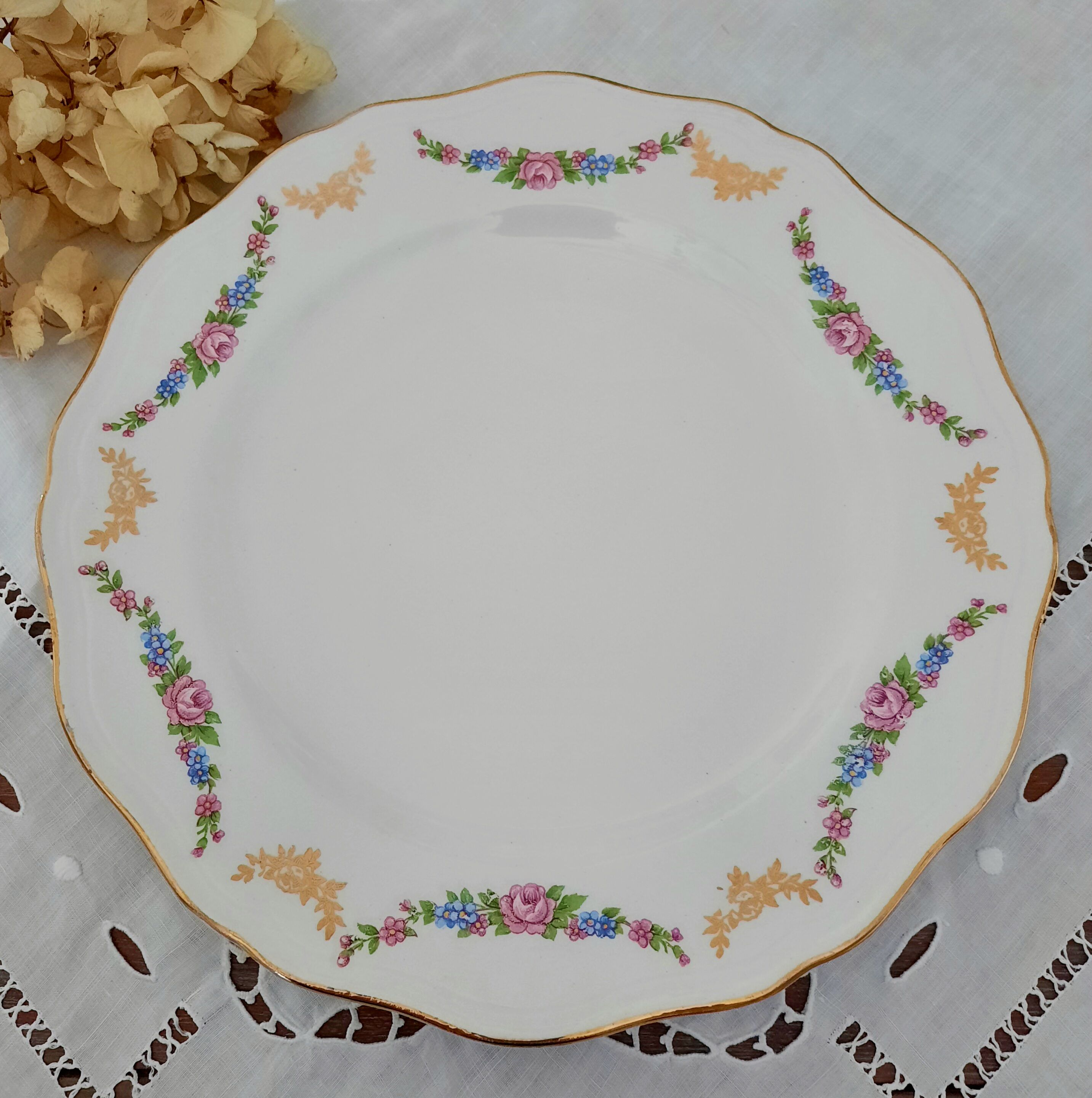 Mismatched old flat plates with gold