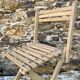 Antique folding chair with wooden slats