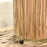Cylindrical lamp in natural raffia