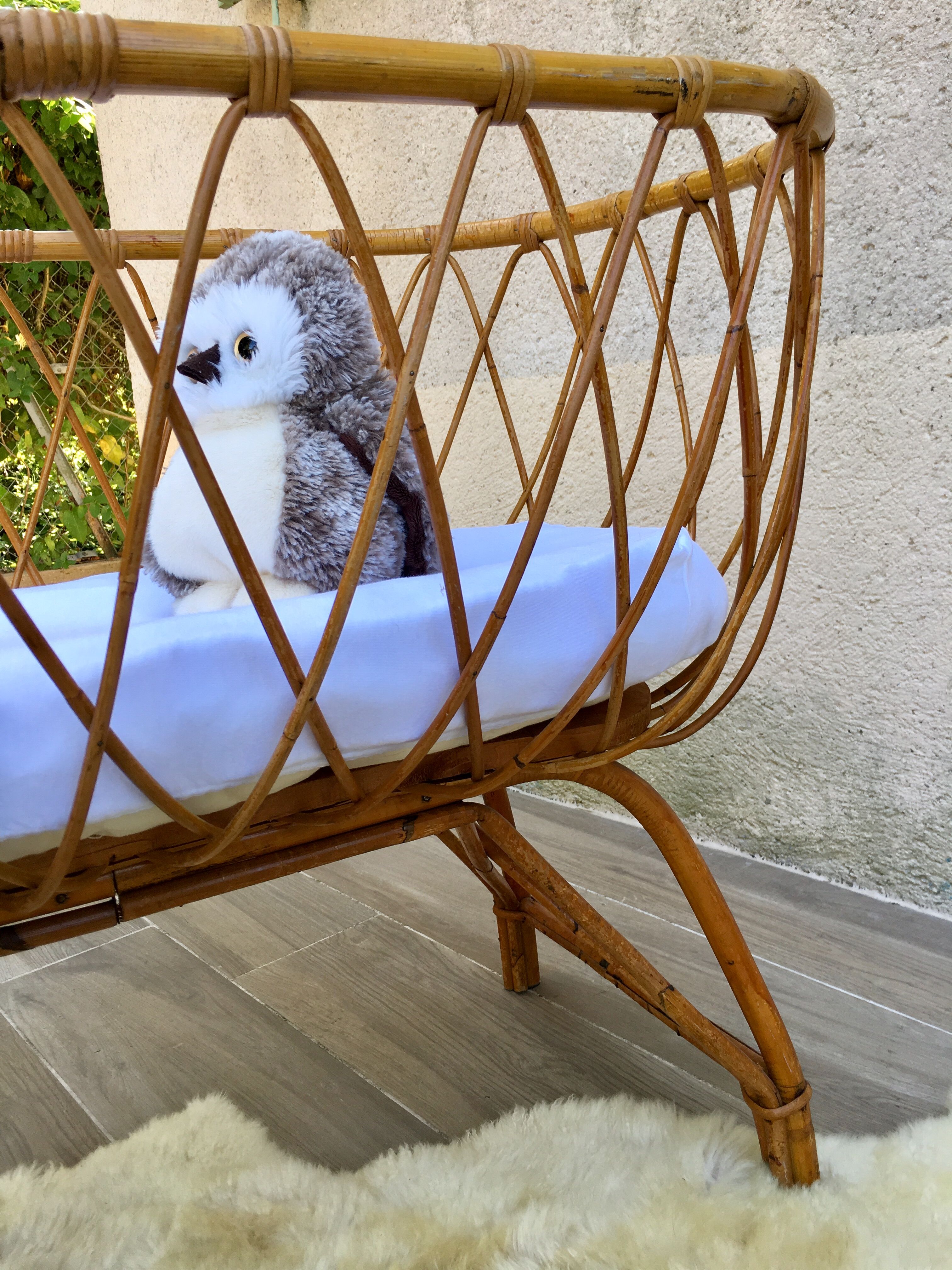 Vintage rattan cradle