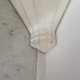 Geometric corner wall lamp in plaster, France 1980.