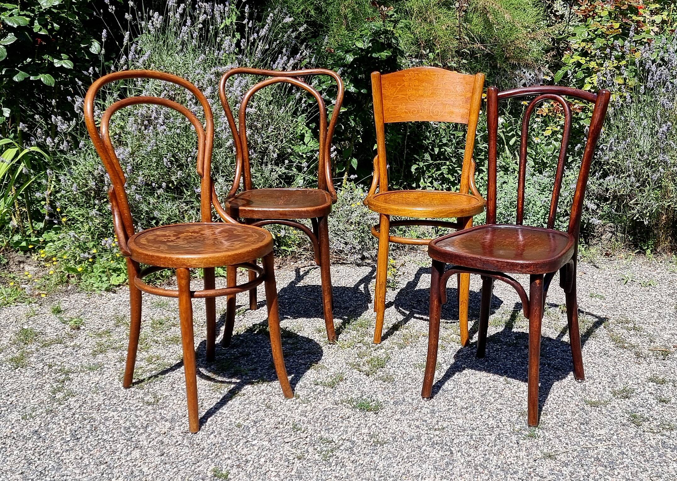 4 curved wooden bistro chairs early twentieth