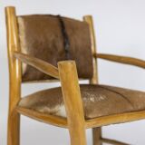 Brutalist style armchair in elm and goatskin, 1970s