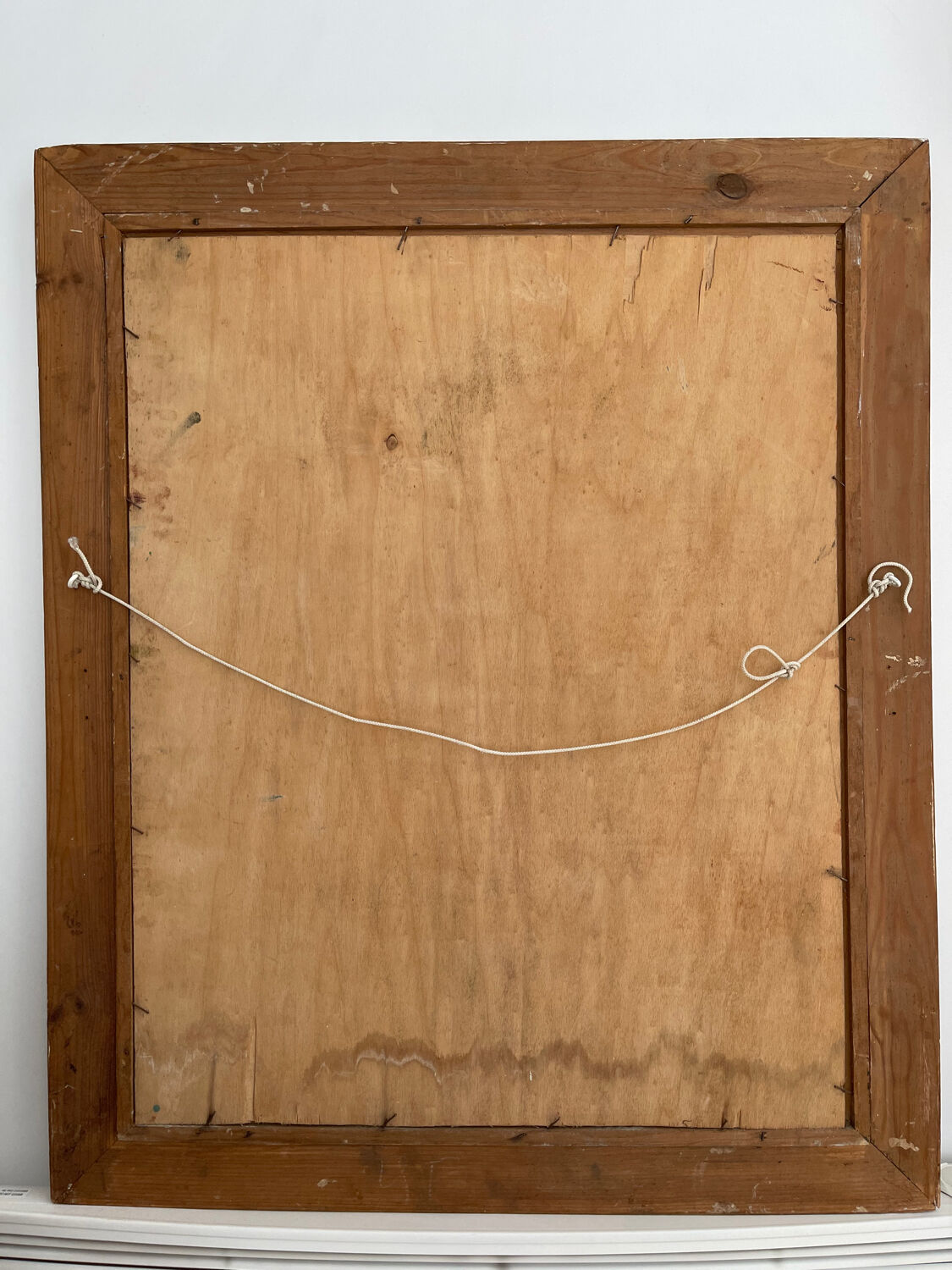 Old wooden table signed with a gold medal.
