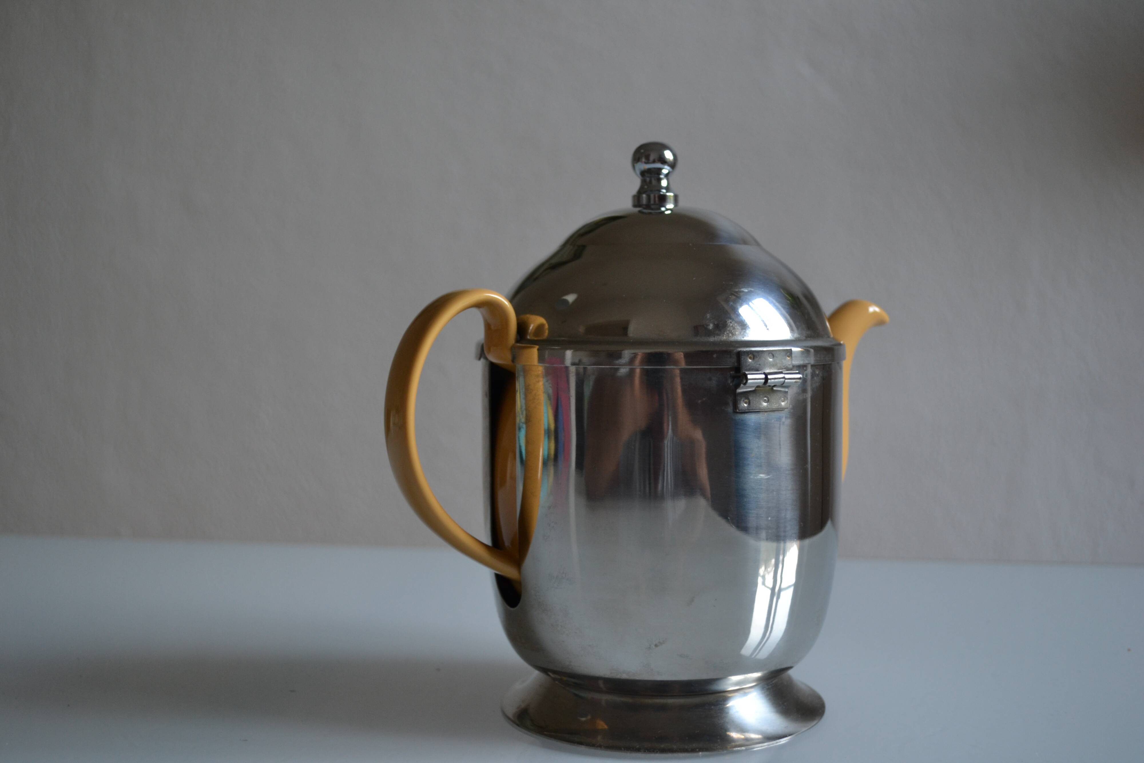 Insulated ceramic teapot with metal and felt 0.5 liters